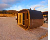 Cubus sauna with wood burning heater