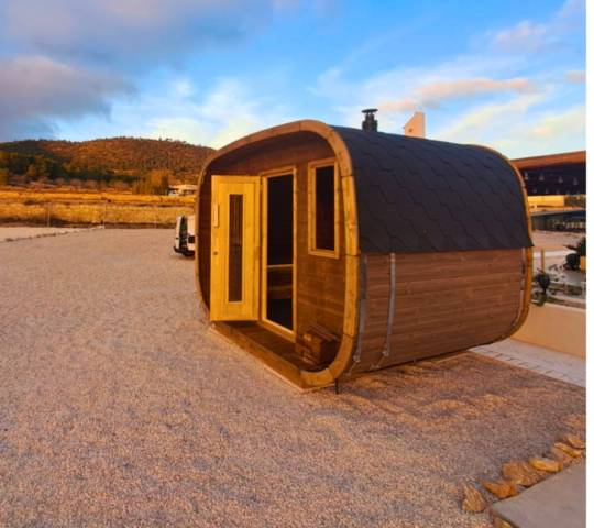 Cubus sauna with wood burning heater