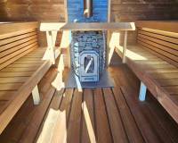 Cubus sauna with wood burning heater