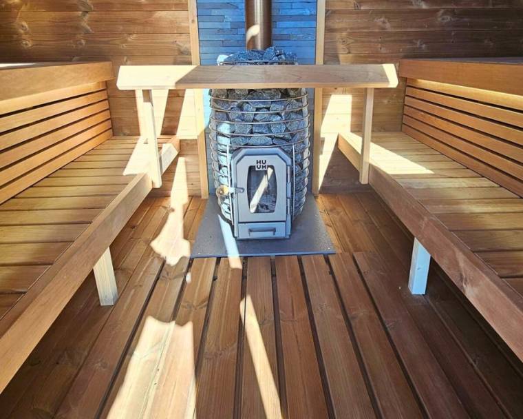 Cubus sauna with wood burning heater